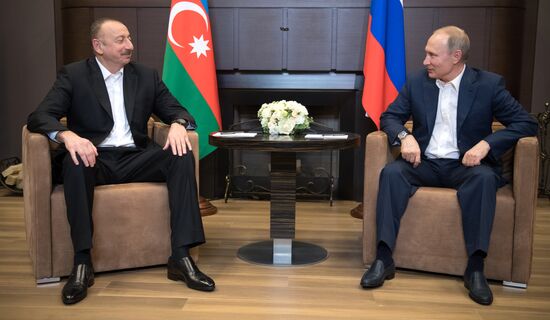 Russian President Vladimir Putin meets with President of Azerbaijan Ilham Aliyev