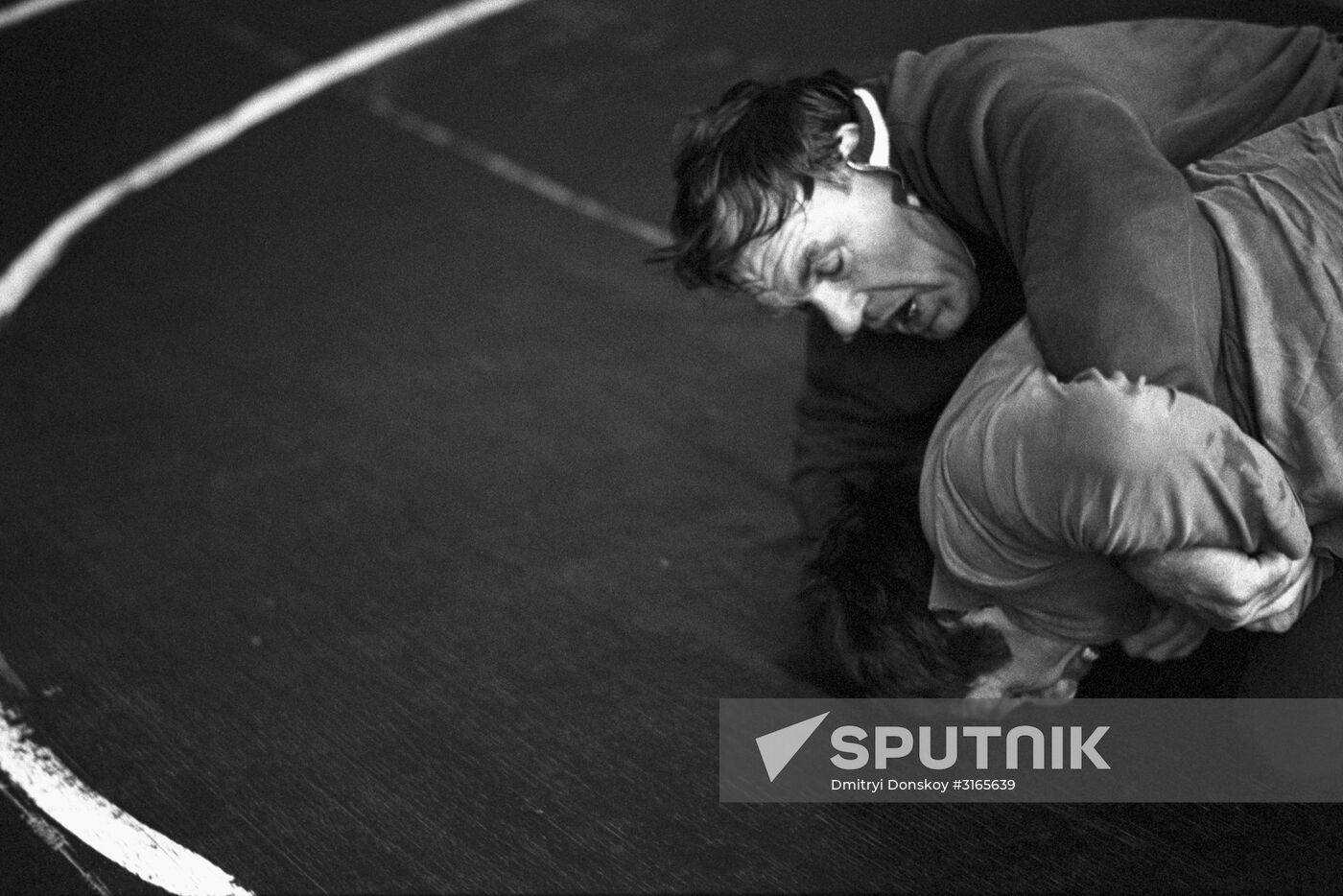 Greco-Roman wrestler Nikolai Balboshin and coach Anatoly Parfyonov