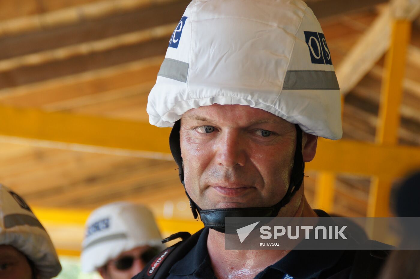 OSCE SMM Principal Deputy Chief to Ukraine Alexander Hug arrives at Stranitsa Luganskaya Village check-point