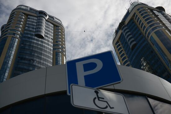 Tightrope walker Maxim Kagin walks between two skyscrapers in Yekaterinburg