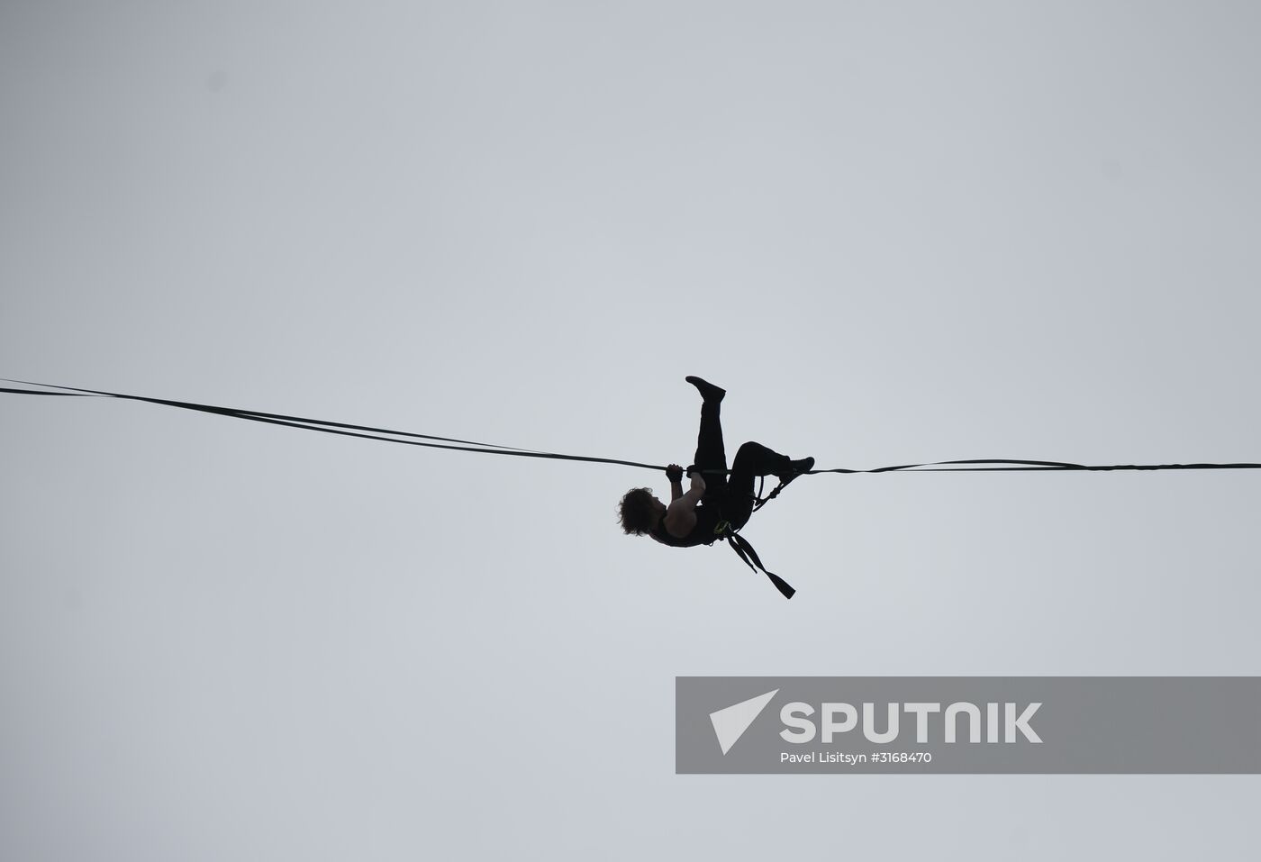 Tightrope walker Maxim Kagin walks between two skyscrapers in Yekaterinburg