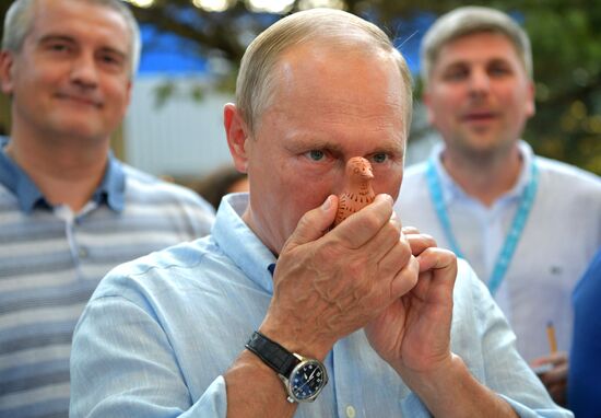 Russian President Vladimir Putin visits Crimea