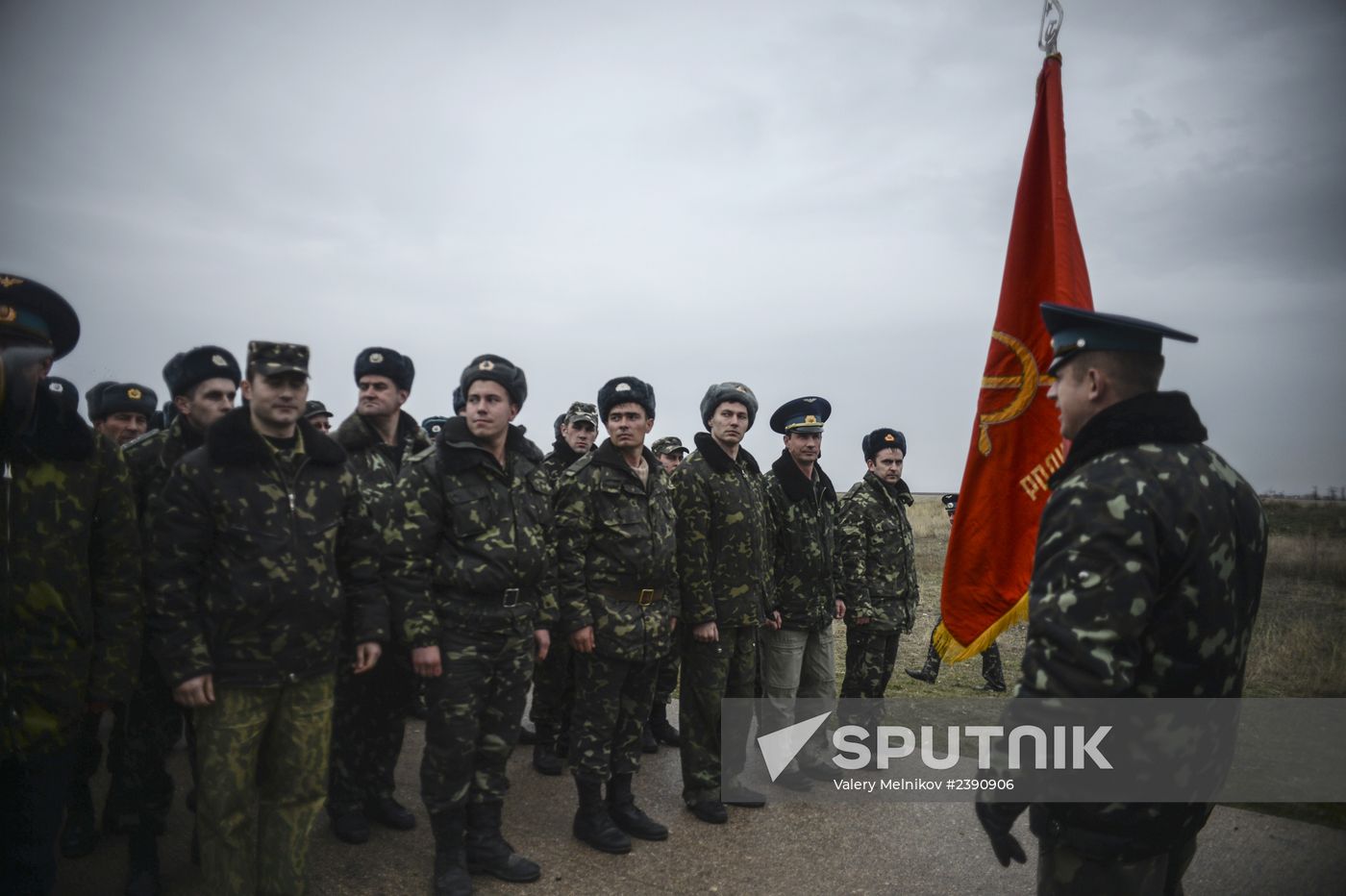 Ukrainian military men negotiate with representatives of Sevastopol self-defense units at Belbek Airbase