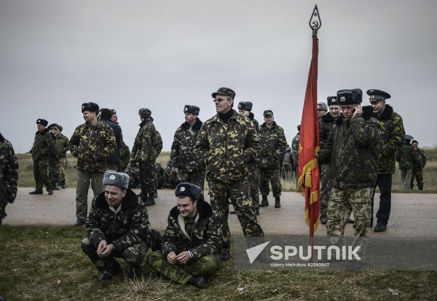 Ukrainian military men negotiate with representatives of Sevastopol self-defense units at Belbek Airbase