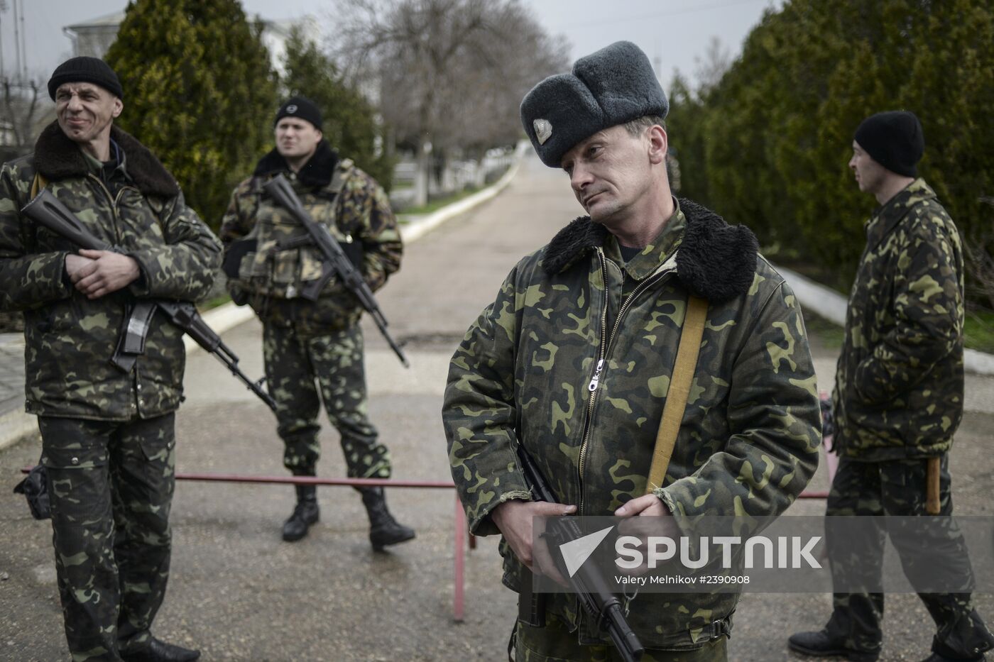Ukrainian military men negotiate with representatives of Sevastopol self-defense units at Belbek Airbase