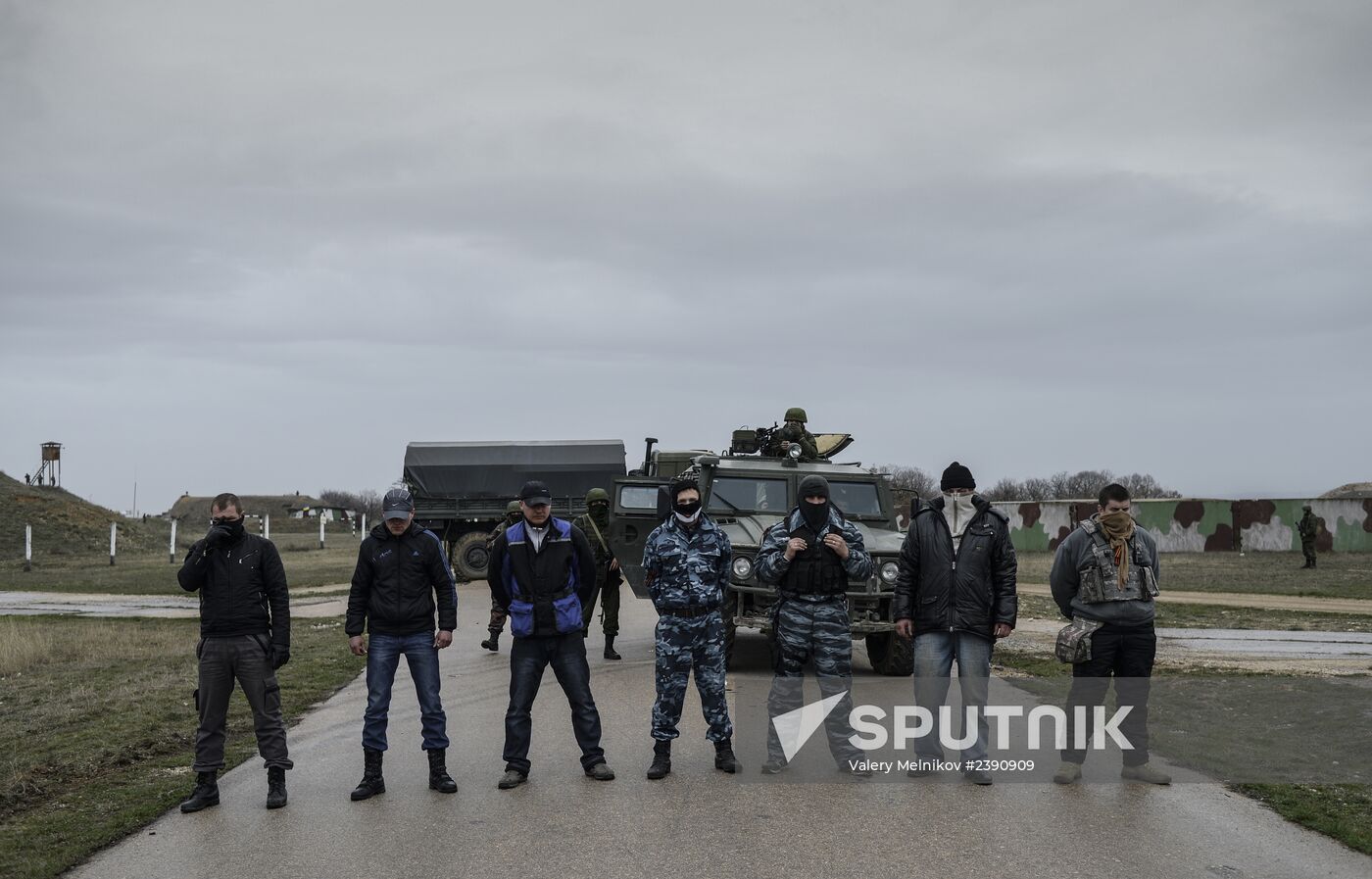 Ukrainian military men negotiate with representatives of Sevastopol self-defense units at Belbek Airbase