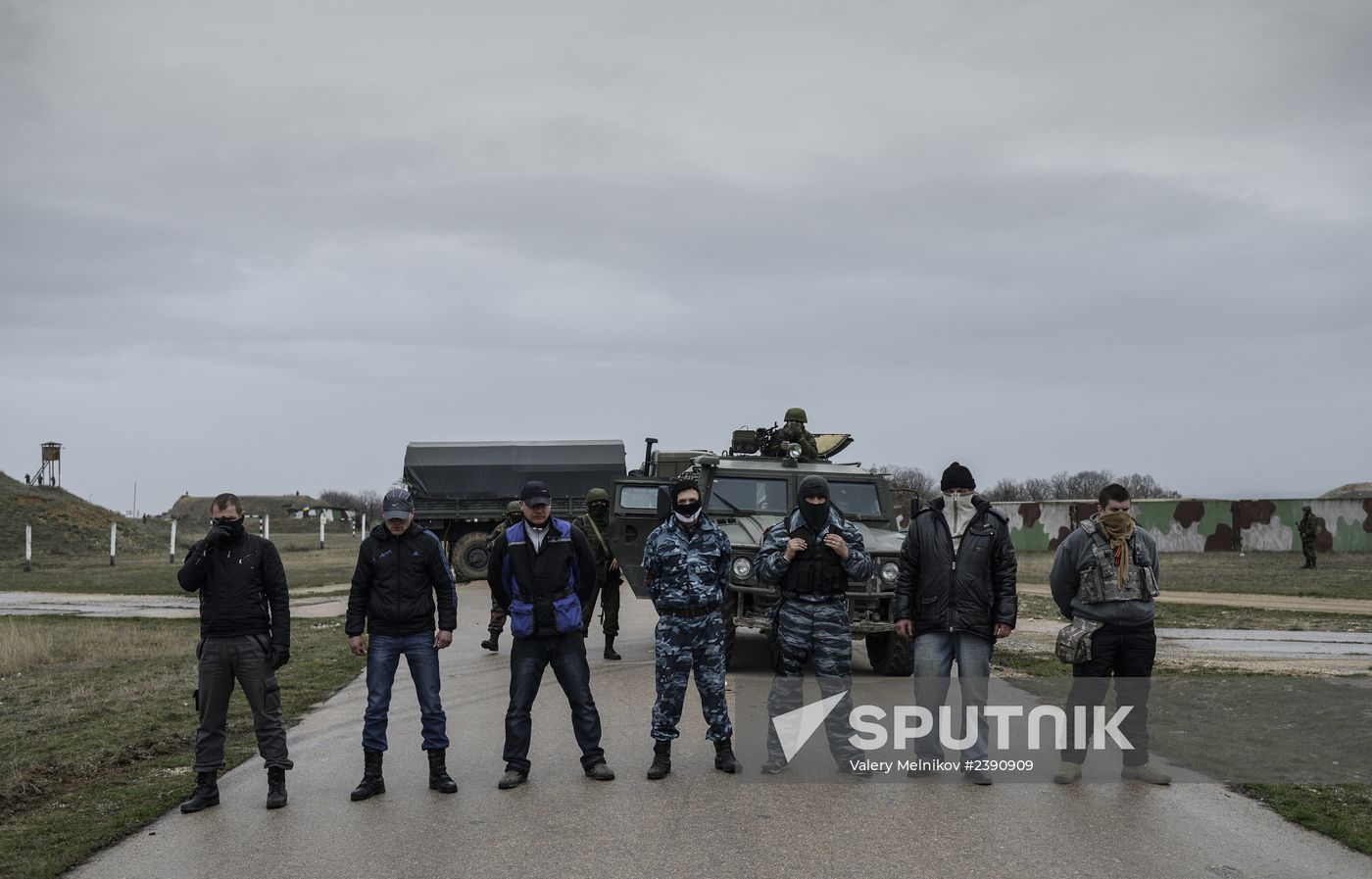 Ukrainian military men negotiate with representatives of Sevastopol self-defense units at Belbek Airbase