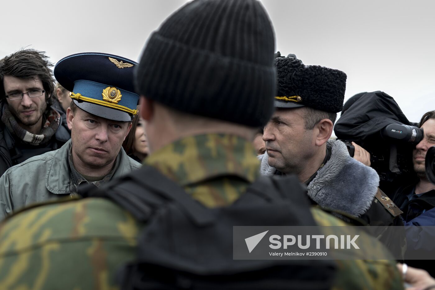 Ukrainian military men negotiate with representatives of Sevastopol self-defense units at Belbek Airbase