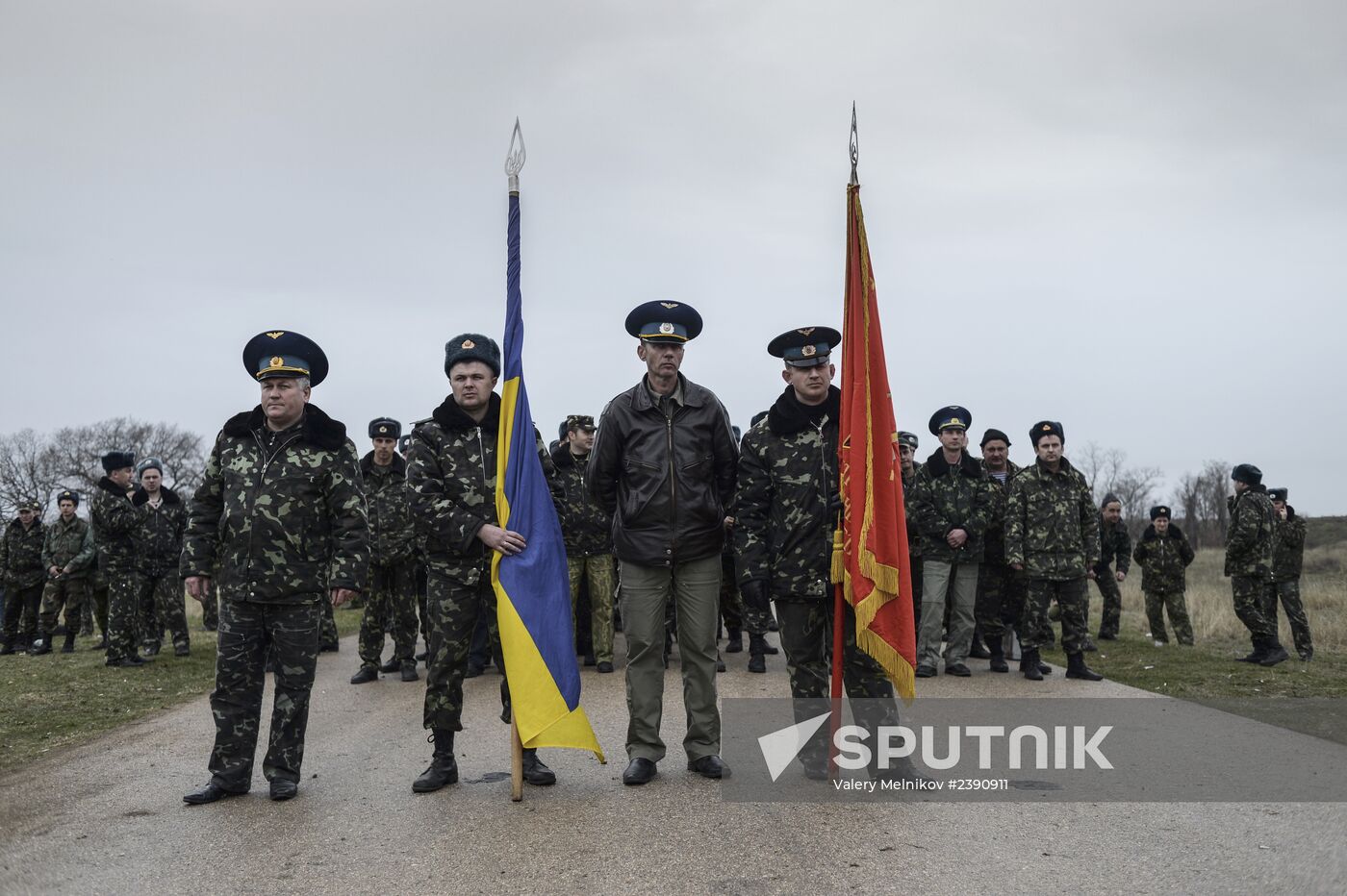 Ukrainian military men negotiate with representatives of Sevastopol self-defense units at Belbek Airbase