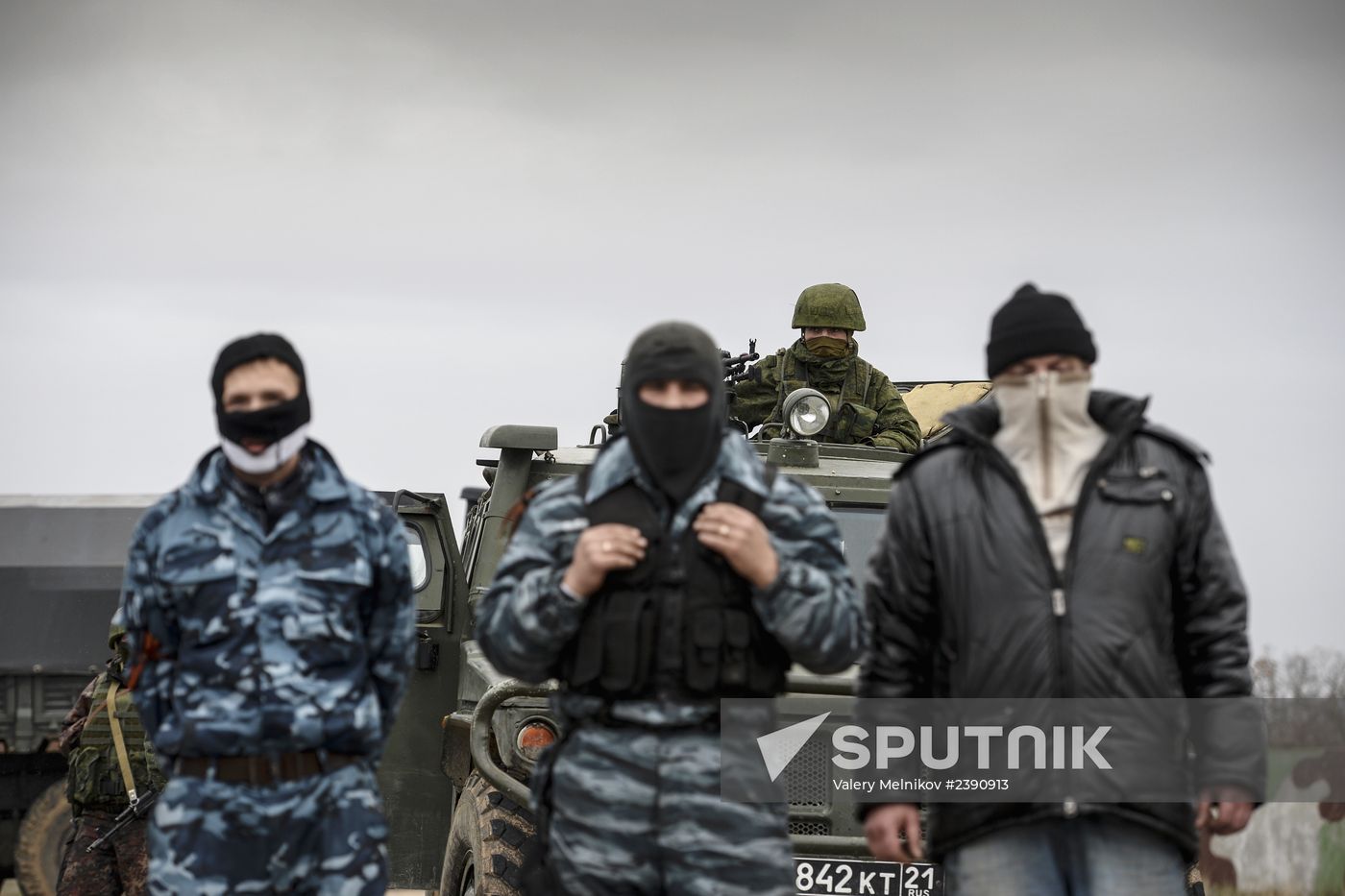 Ukrainian military men negotiate with representatives of Sevastopol self-defense units at Belbek Airbase