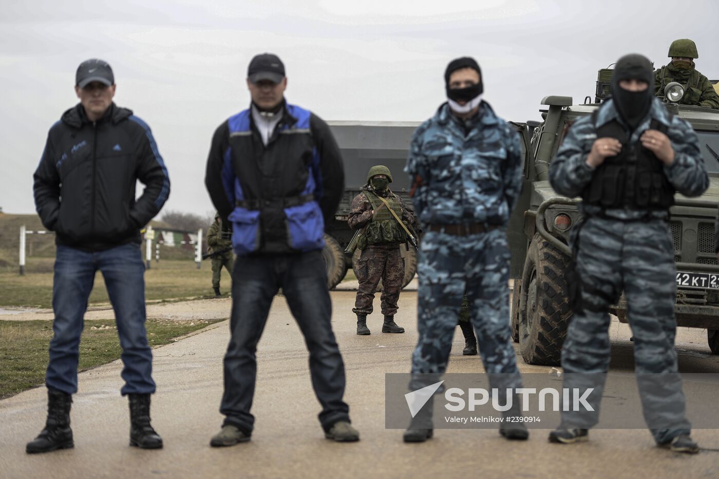 Ukrainian military men negotiate with representatives of Sevastopol self-defense units at Belbek Airbase