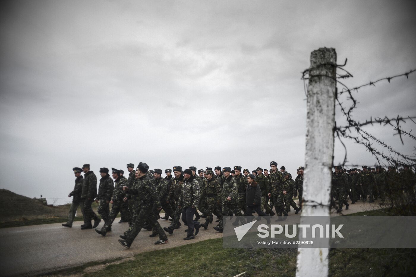 Ukrainian military men negotiate with representatives of Sevastopol self-defense units at Belbek Airport