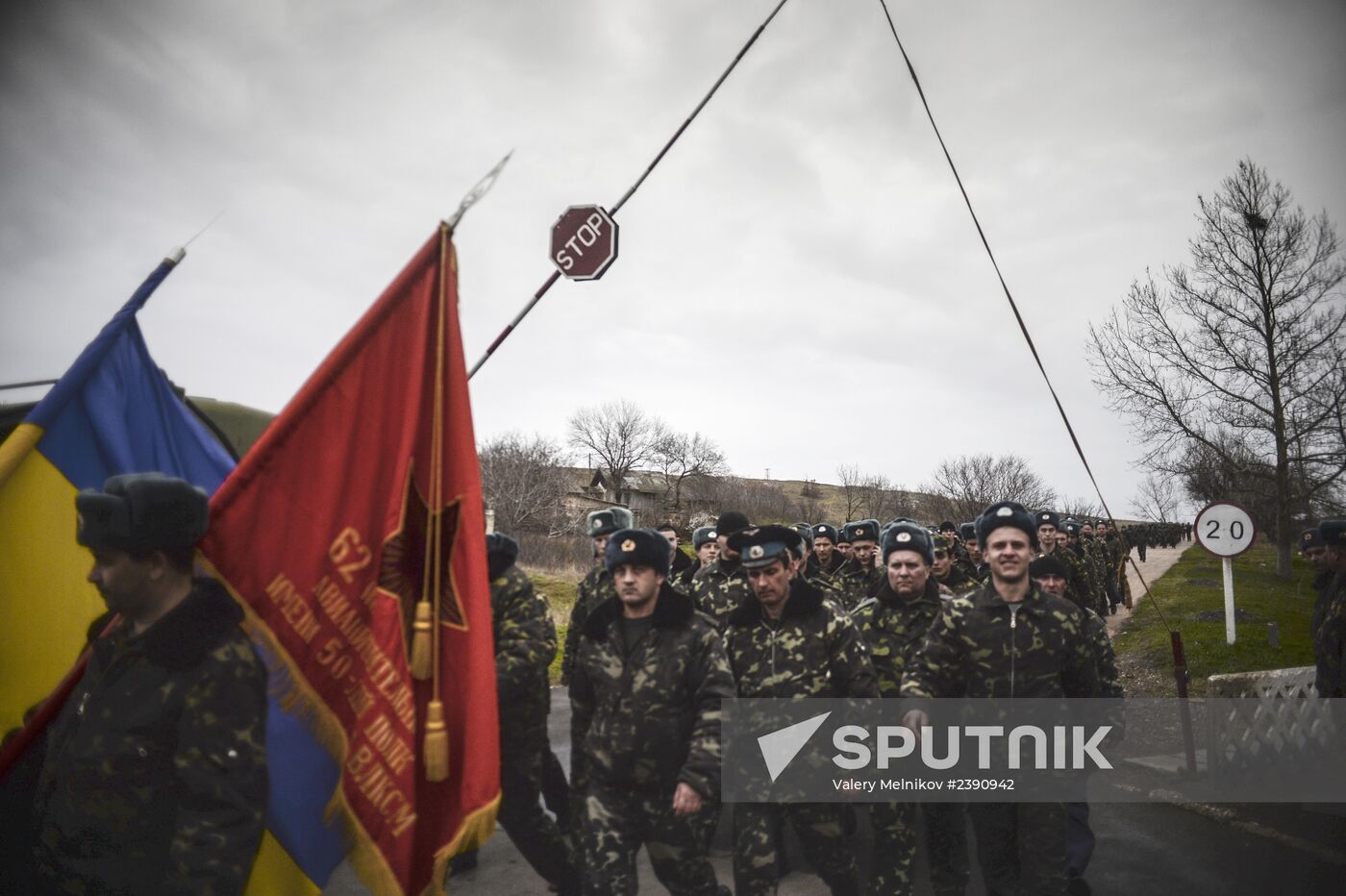 Ukrainian military men negotiate with representatives of Sevastopol self-defense units at Belbek Airport