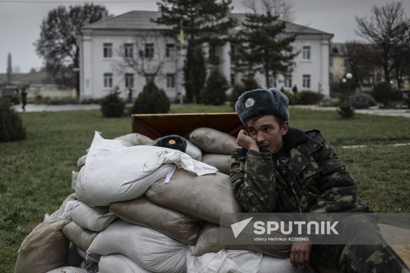 Ukrainian military men negotiate with representatives of Sevastopol self-defense units at Belbek Airbase