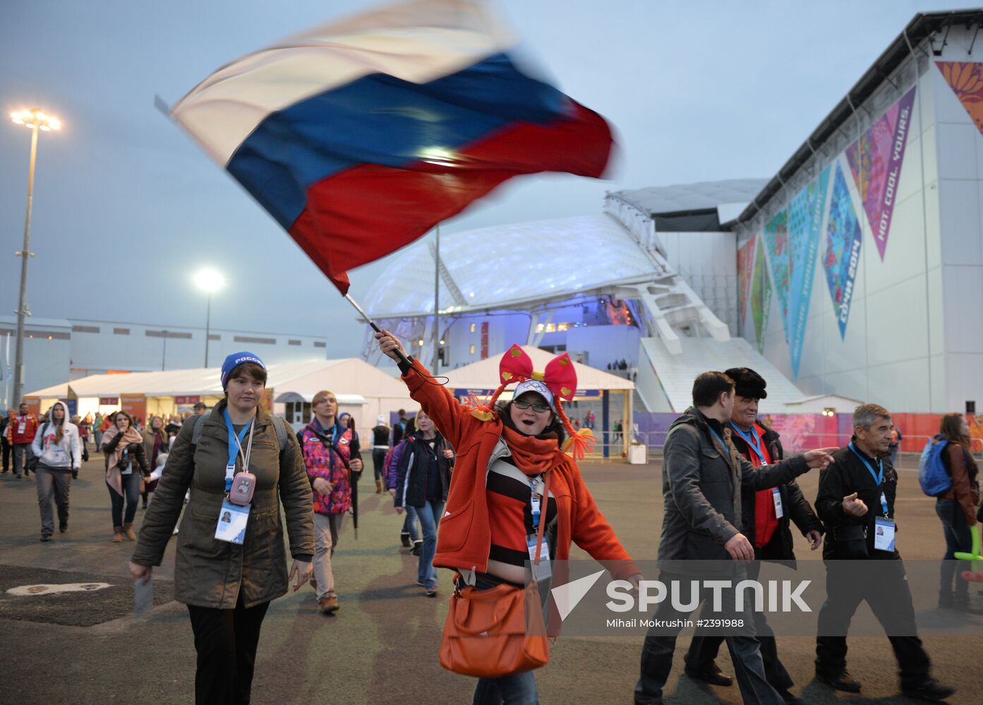 Spectators arrive at the opening ceremony of the Sochi 2014 Paralympic Winter Games