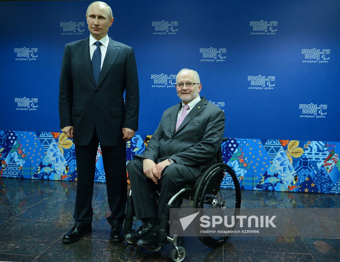 Vladimir Putin before opening ceremony of Sochi 2014 Winter Paralympic Games