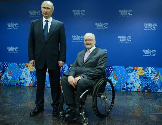 Vladimir Putin before opening ceremony of Sochi 2014 Winter Paralympic Games