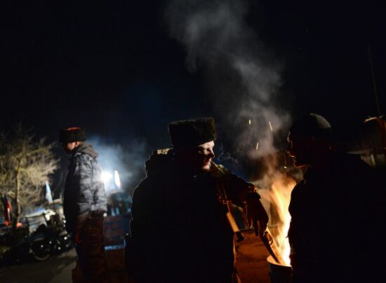 Truck convoy with humanitarian aid from Russian bikers is met in Crimea