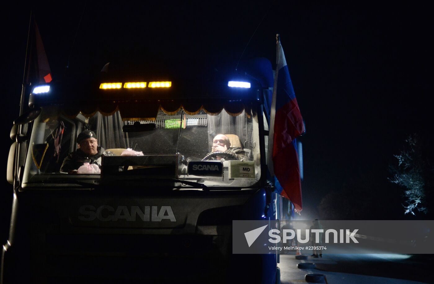 Truck convoy with humanitarian aid from Russian bikers is met in Crimea