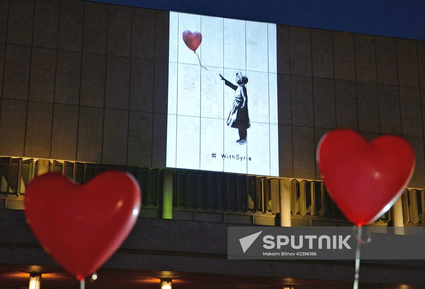 Installation of works by Banksy on a wall in the State Tretyakov Gallery