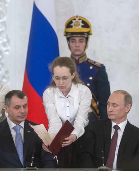 Signing Russian Federation-Crimea Treaty on Crimea's integration with Russia and formation of new jurisdictions in Russian Federation