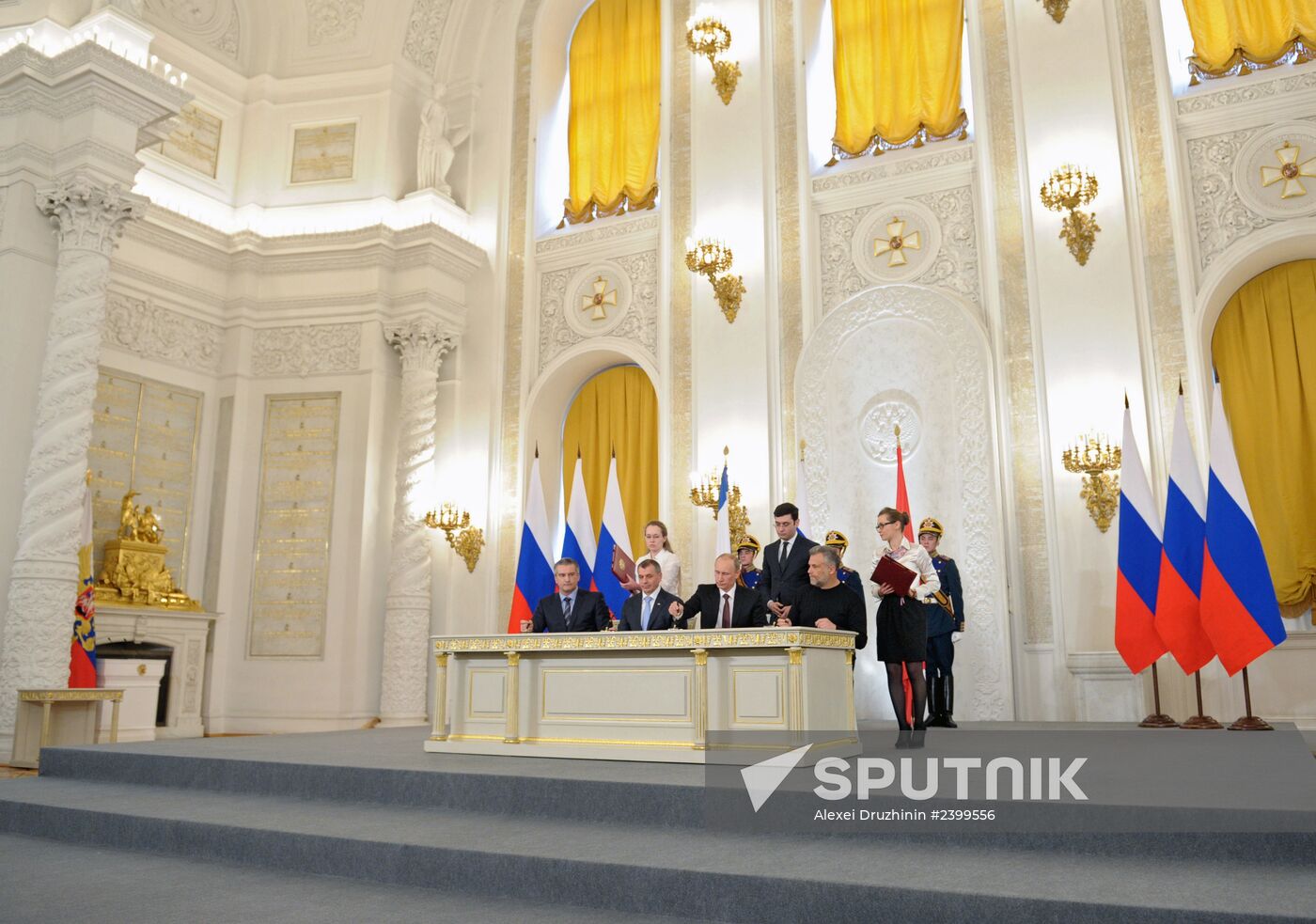 President Vladimir Putin (second right, foreground) attending the Kremlin ceremony on signing the Russian Federation-Crimea Treaty on Crimea's integration with Russia and formation of new jurisdictions in the Russian Federation, March 18, 2014. From left: Sergei Aksyonov, Prime Minister of the Autonomous Republic of Crimea, and Vladimir Konstantinov, Chairman of Crimea's Supreme Council. Right: Aleksei Chaly, head of Sevastopol. Location: Russia, Moscow. Author: Alexei Druzhinin/Sputnik. Signing Russian Federation-Crimea Treaty on Crimea's integration with Russia and formation of new jurisdictions in Russian Federation