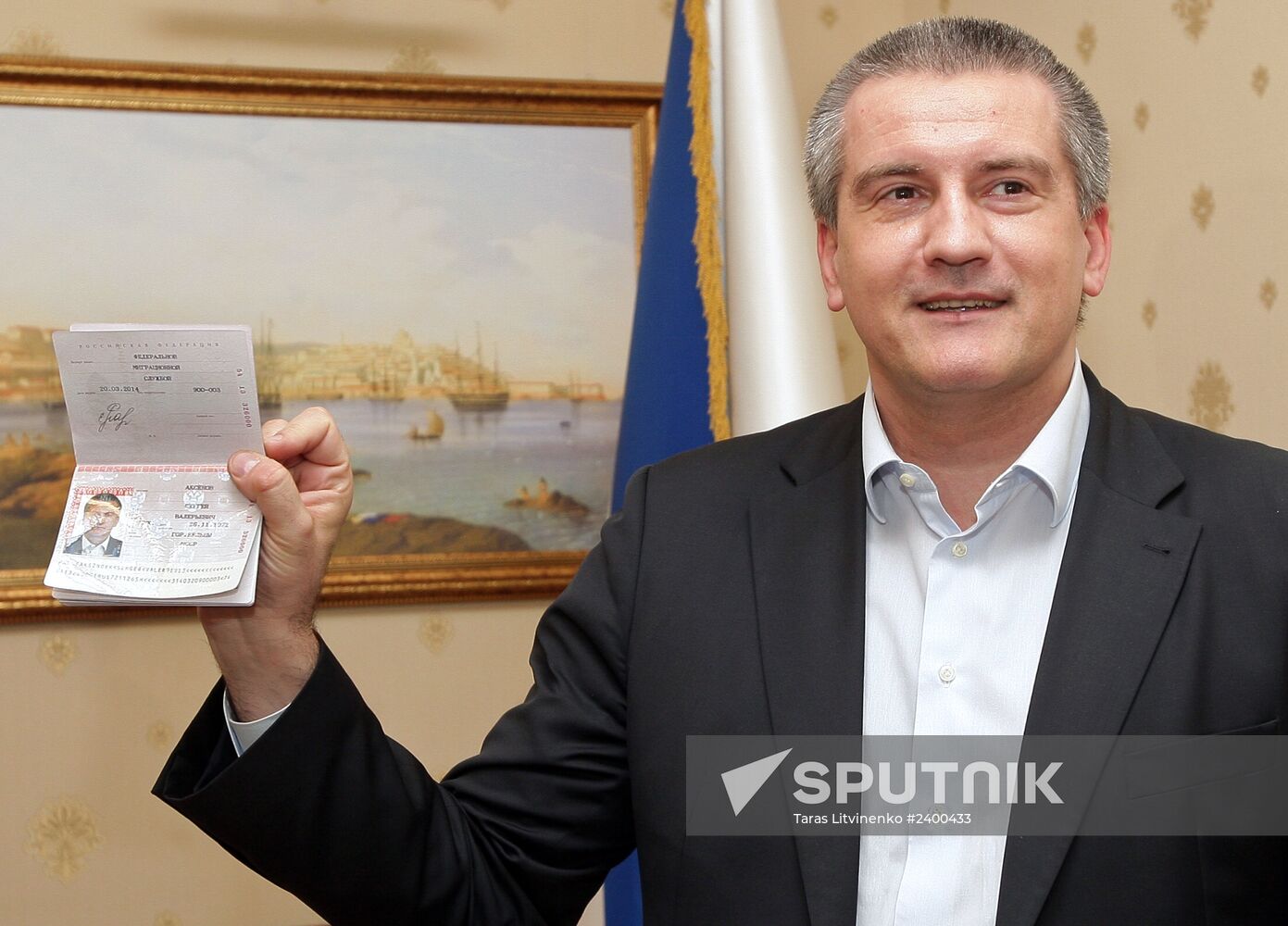Crimean Prime Minister Sergei Aksyonov gets a Russian passport
