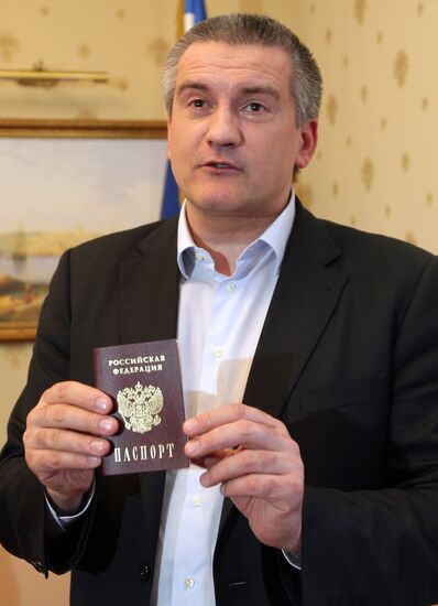 Crimean Prime Minister Sergei Aksyonov gets a Russian passport