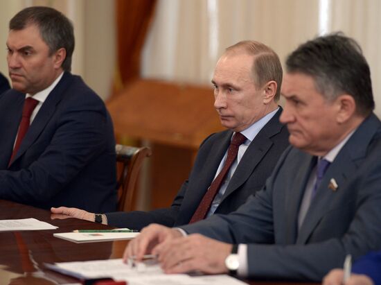 Vladimir Putin meets with senior members of the Federation Council