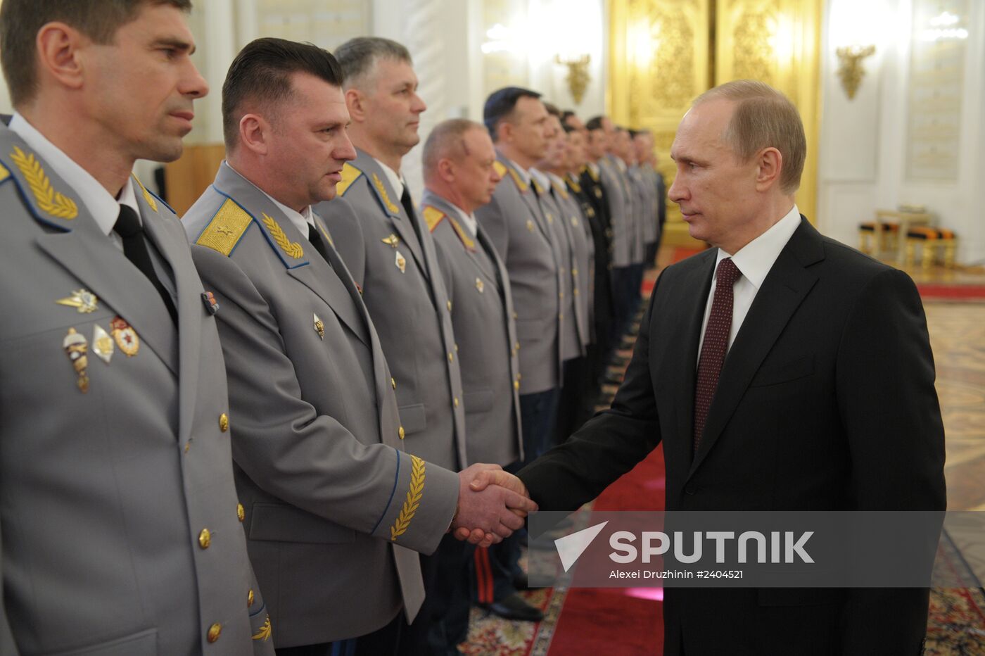 Vladimir Putin attends Kremlin reception presenting senior officers