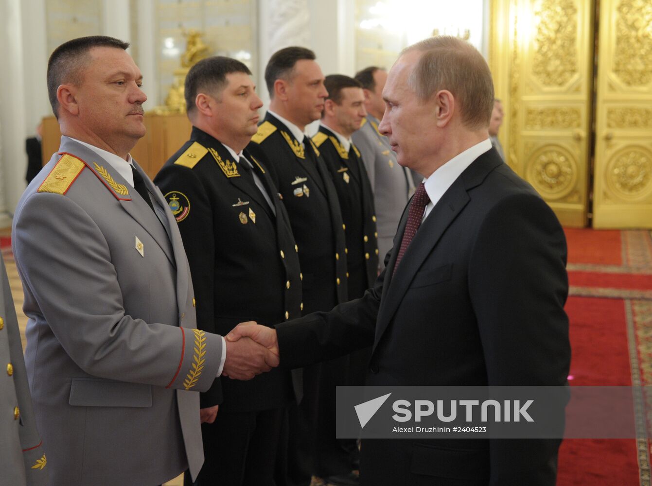 Vladimir Putin attends Kremlin reception presenting senior officers