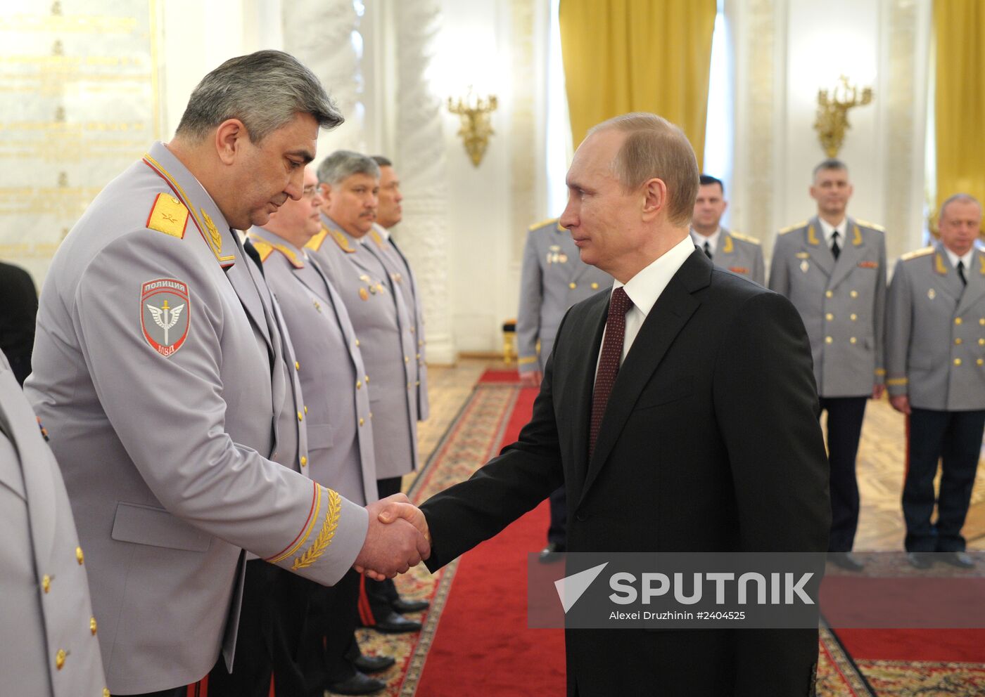 Vladimir Putin attends Kremlin reception presenting senior officers