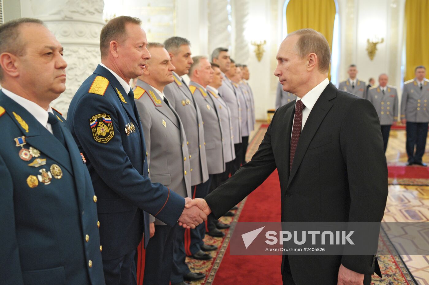 Vladimir Putin attends Kremlin reception presenting senior officers