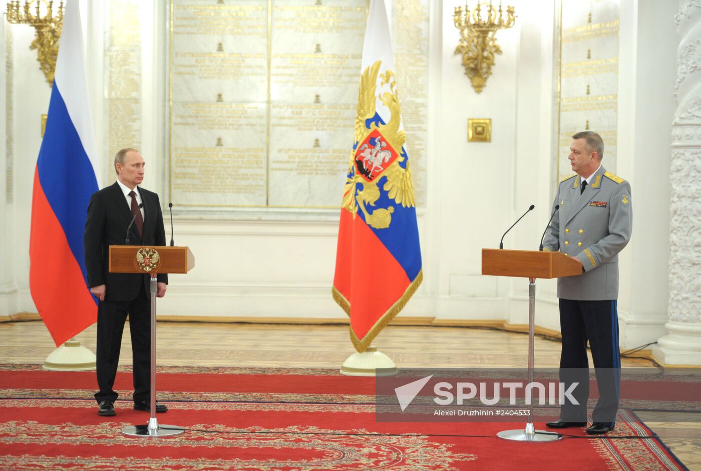 Vladimir Putin attends Kremlin reception presenting senior officers