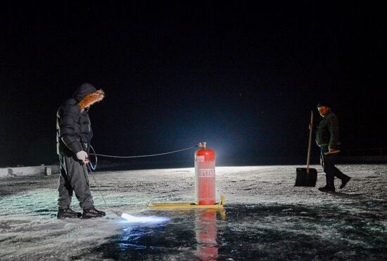 Night Hockey League exhibition match on ice of Lake Baikal