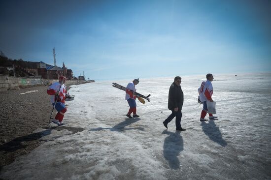 Night Hockey League exhibition match on ice of Lake Baikal