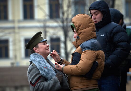 Actors and crew on set of film Battalion of Death in St. Petersburg