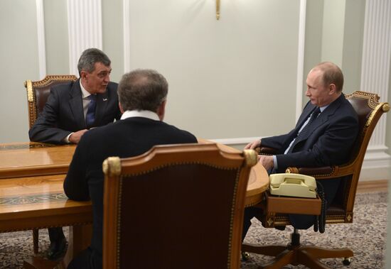 V.Putin meets with S.Menyailo and A.Chaly