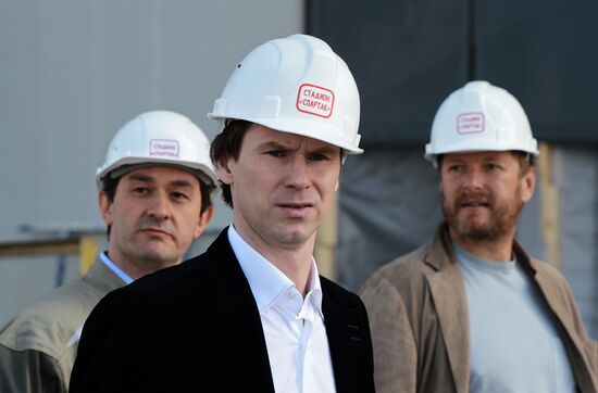 Yegor Titov and Yevgeny Kafelnikov visit construction site of Otkrytie Arena stadium