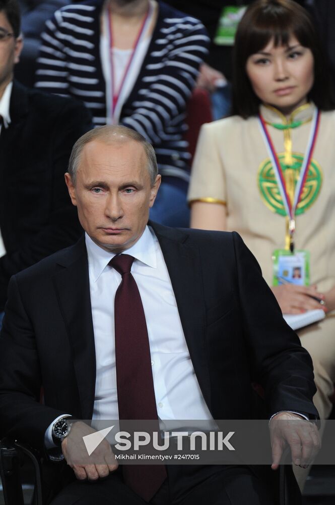 Vladimir Putin attends first media forum, all-Russia People's Front