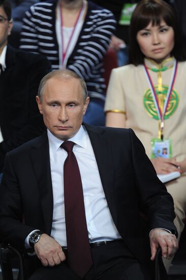 Vladimir Putin attends first media forum, all-Russia People's Front