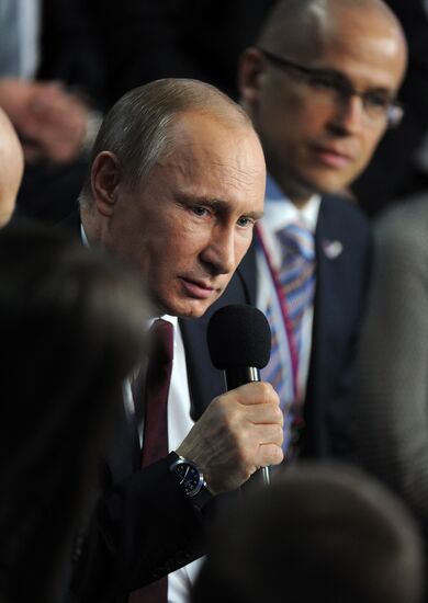 Vladimir Putin attends first media forum, all-Russia People's Front
