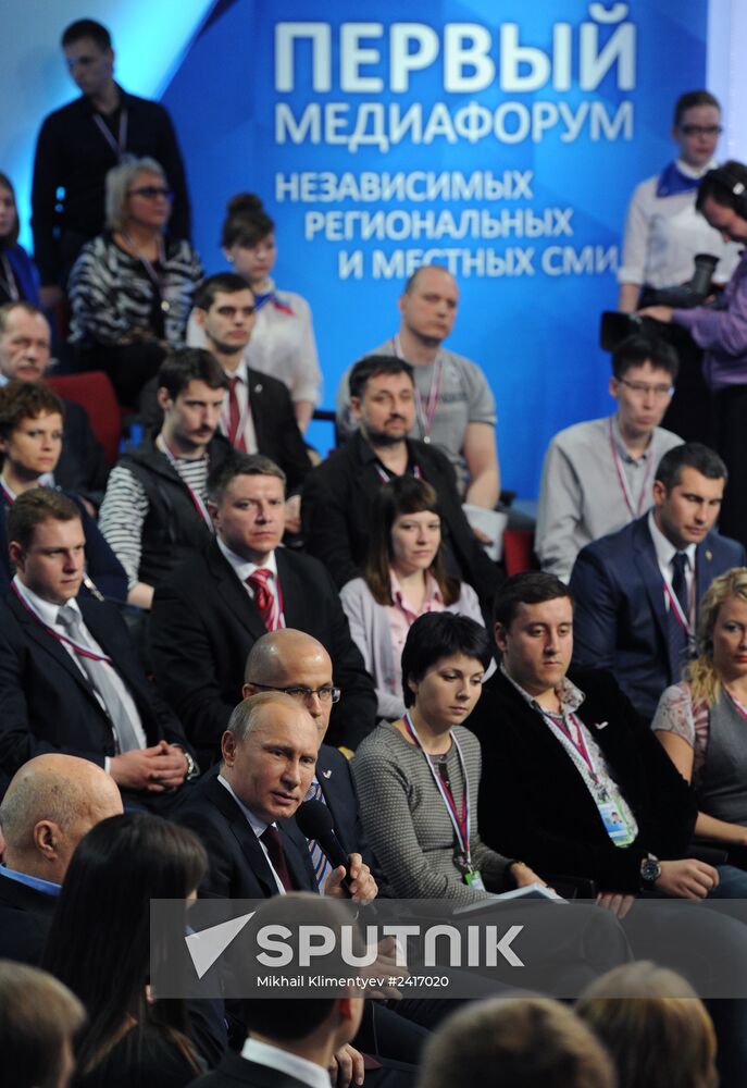 Vladimir Putin attends first media forum, all-Russia People's Front