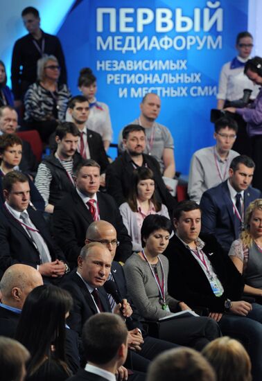 Vladimir Putin attends first media forum, all-Russia People's Front