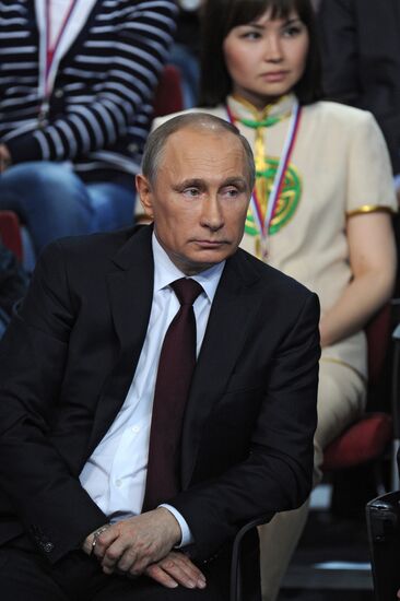Vladimir Putin attends first media forum, all-Russia People's Front