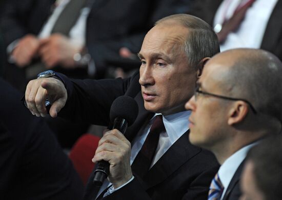 Vladimir Putin attends first media forum, all-Russia People's Front