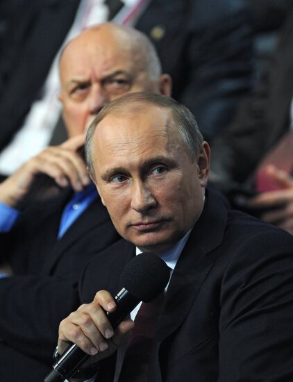 Vladimir Putin attends first media forum, all-Russia People's Front