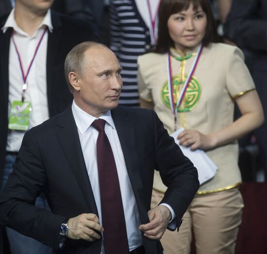Vladimir Putin attends first media forum, all-Russia People's Front