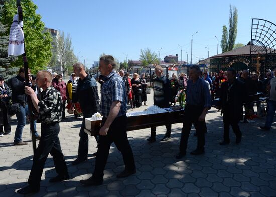 A funeral service for self-defence soldier Alexander Lubenets killed in Donetsk region