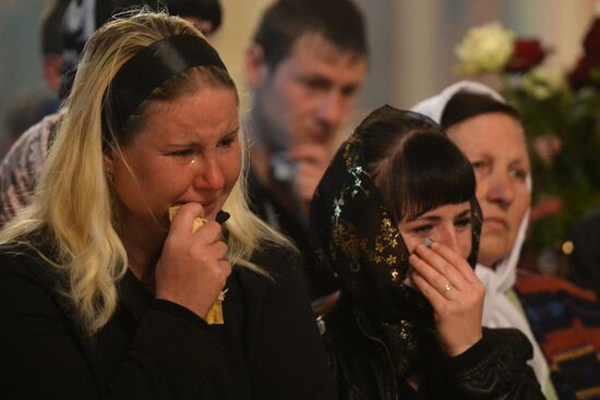 A funeral service for self-defence soldier Alexander Lubenets killed in Donetsk region